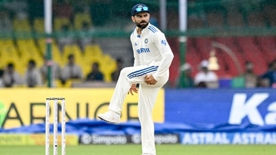 India's Virat Kohli looks on as rains halts play during the first day of the second Test cricket match. (AFP) India's Virat Kohli looks on as rains halts play during the first day of the second Test cricket match. (AFP)