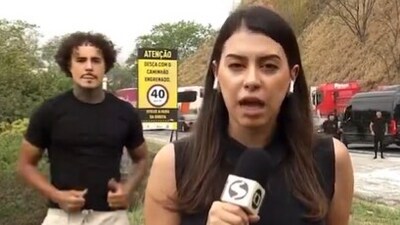 Brazilian singer MC Livinho faced backlash after dancing during a live report on a deadly bus crash. (X/TuuitaWill) Brazilian singer MC Livinho faced backlash after dancing during a live report on a deadly bus crash. (X/TuuitaWill)