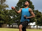 Hardik Pandya bowling with a red ball. Hardik Pandya bowling with a red ball.