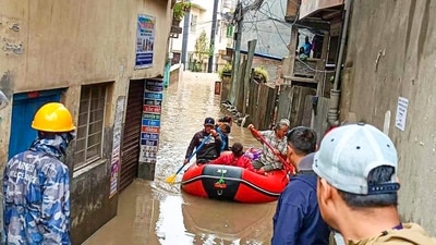 Rescue operation underway after floods inundated parts of Nepal following heavy rainfall, in Kathmandu. (PTI) Rescue operation underway after floods inundated parts of Nepal following heavy rainfall, in Kathmandu. (PTI)