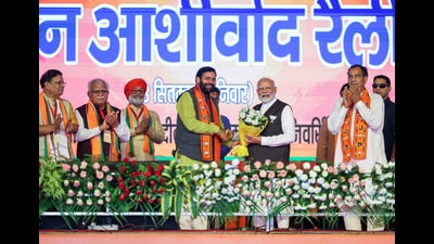 Prime Minister Narendra Modi being greeted by Haryana CM Nayab Singh Saini during a rally state assembly elections on in Hisar on Saturday. (ANI) Prime Minister Narendra Modi being greeted by Haryana CM Nayab Singh Saini during a rally state assembly elections on in Hisar on Saturday. (ANI)
