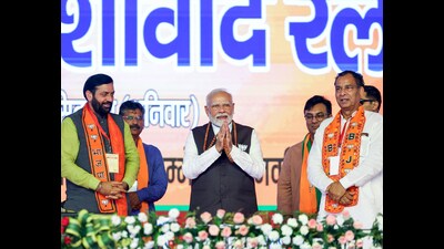 Prime Minister Narendra Modi greets the gathering during a public meeting for the Haryana Assembly elections, in Hisar on Saturday. Haryana Chief Minister Nayab Singh Saini is also present. (ANI Photo) Prime Minister Narendra Modi greets the gathering during a public meeting for the Haryana Assembly elections, in Hisar on Saturday. Haryana Chief Minister Nayab Singh Saini is also present. (ANI Photo)