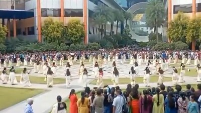Screengrab from a video showing Onam celebrations at Infosys Bengaluru (X/@KariSubbayya) Screengrab from a video showing Onam celebrations at Infosys Bengaluru (X/@KariSubbayya)
