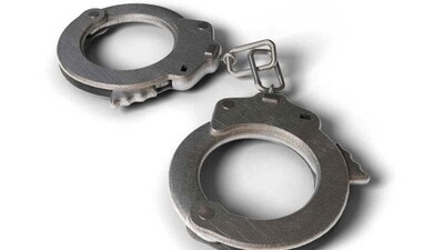 Police seized multiple mobile devices, debit cards, bank passbooks, and cash. (Representational image) Police seized multiple mobile devices, debit cards, bank passbooks, and cash. (Representational image)