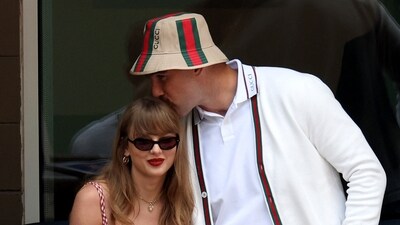 Taylor Swift and Travis Kelce of the Kansas City Chiefs attend the Men's Singles Final match. Jamie Squire/Getty Images/AFP (Photo by JAMIE SQUIRE / GETTY IMAGES NORTH AMERICA / Getty Images via AFP) (Getty Images via AFP) Taylor Swift and Travis Kelce of the Kansas City Chiefs attend the Men's Singles Final match. Jamie Squire/Getty Images/AFP (Photo by JAMIE SQUIRE / GETTY IMAGES NORTH AMERICA / Getty Images via AFP) (Getty Images via AFP)