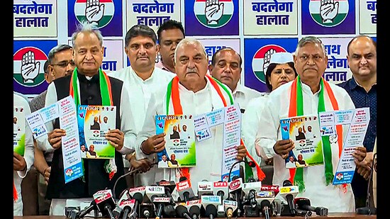 Congress leaders Bhupinder Hooda and Ashok Gehlot with others during a press conference in Chandigarh on Saturday. (PTI)