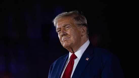 Former US President and Republican presidential nominee Donald Trump smiles at the crowd during a Town Hall event at Macomb Community College on September 27, 2024 in Warren, Michigan. (Photo by Emily Elconin / GETTY IMAGES NORTH AMERICA / Getty Images via AFP) (Getty Images via AFP)