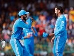 India's captain Rohit Sharma and Virat Kohli celebrate a wicket during the 2nd ODI match against Sri Lanka India's captain Rohit Sharma and Virat Kohli celebrate a wicket during the 2nd ODI match against Sri Lanka
