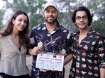 Raaj Shaandilyaa with Rajkummar Rao and Triptii Dimri.