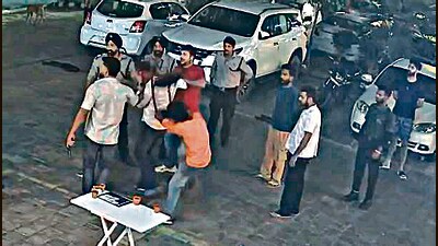 A CCTV grab of the brawl outside the cafe in Sector 68’s District One market in Mohali. (HT Photo) A CCTV grab of the brawl outside the cafe in Sector 68’s District One market in Mohali. (HT Photo)