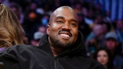 Kanye West, known as Ye, watches the first half of an NBA basketball game between the Washington Wizards and the Los Angeles Lakers (AP Photo/Ashley Landis, File) (AP) Kanye West, known as Ye, watches the first half of an NBA basketball game between the Washington Wizards and the Los Angeles Lakers (AP Photo/Ashley Landis, File) (AP)