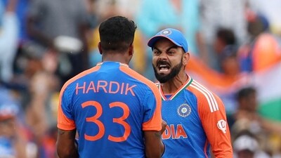 India's Hardik Pandya celebrates with Virat Kohli after South Africa's David Miller was caught out by Suryakumar Yadav in the T20 World Cup final. (REUTERS)
