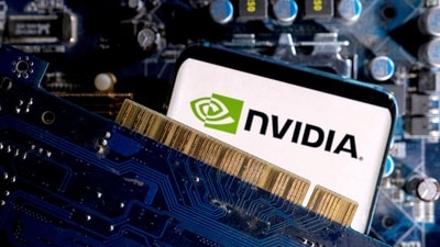 A smartphone with a displayed NVIDIA logo is placed on a computer motherboard in this illustration taken March 6, 2023. (Dado Ruvic/Reuters)