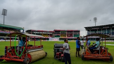 Groundsmen at the Green Park Stadium during the third day of the 2nd Test cricket match between India and Bangladesh, in Kanpur, Sunday, Sep. 29 (PTI) Groundsmen at the Green Park Stadium during the third day of the 2nd Test cricket match between India and Bangladesh, in Kanpur, Sunday, Sep. 29 (PTI)