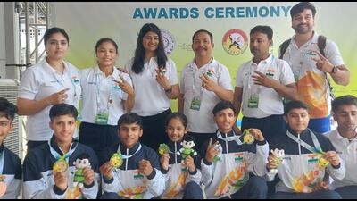 The Indian wushu team with their medals at the Junior World Championships in Brunei. (HT) The Indian wushu team with their medals at the Junior World Championships in Brunei. (HT)