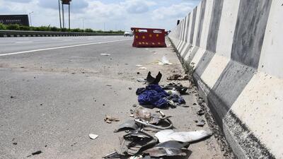 The spot where the trio riding two-wheeler without helmets, crashed into a truck parked on the DME. (Sakib Ali/HT Photo) The spot where the trio riding two-wheeler without helmets, crashed into a truck parked on the DME. (Sakib Ali/HT Photo)