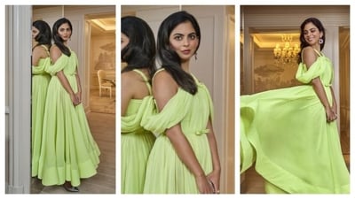 Isha Ambani sported a delicate look that radiated a princess aesthetic. The off-shoulder parrot green dress had a voluminous skirt with a loose pleated structure at the hemline. The entire ensemble was classy, with a casual breeziness. (Instagram/@anitashroffadajania) Isha Ambani sported a delicate look that radiated a princess aesthetic. The off-shoulder parrot green dress had a voluminous skirt with a loose pleated structure at the hemline. The entire ensemble was classy, with a casual breeziness. (Instagram/@anitashroffadajania)