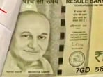 The fake currency notes featured Anupam Kher's photo instead of Mahatma Gandhi. The fake currency notes featured Anupam Kher's photo instead of Mahatma Gandhi.