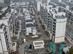 A drone view of an under-construction residential development by Country Garden in Shanghai, Chin. Downpayment ratios are lowered, effective Oct. 1, as part of measures to stabilize the struggling property sector amid economic challenges.