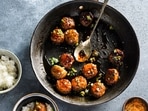 This image released by Milk Street shows a recipe for Japanese chicken meatballs. 