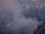 Smoke billows over Beirut's southern suburbs after a strike, amid ongoing hostilities between Hezbollah and Israeli forces, as seen from Sin El Fil, Lebanon.