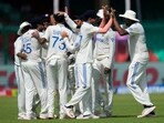 Indian players, including Ravichandran Ashwin and Ravindra Jadeja, celebrate the wicket of Litton Das. Indian players, including Ravichandran Ashwin and Ravindra Jadeja, celebrate the wicket of Litton Das.