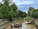 A drone view shows rescue personnel working in a flooded area, following the pass of Hurricane Helene, in Asheville, North Carolina, U.S., September 29, 2024 (REUTERS/Marco Bello)