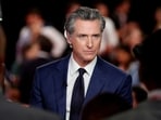 FILE PHOTO: California Governor Gavin Newsom (D) reacts as he speaks to the members of the press on the day of the first presidential debate hosted by CNN in Atlanta, Georgia, U.S., June 27, 2024. REUTERS/Marco Bello/File Photo