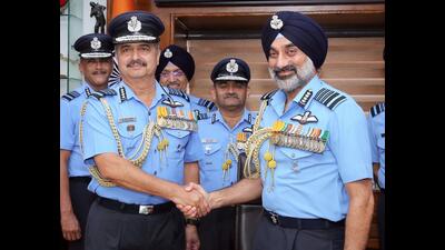 Air Chief Marshal AP Singh (right) takes over as the IAF chief, succeeding Air Chief Marshal VR Chaudhari (left) at Vayu Bhawan in Delhi on Monday. Air Chief Marshal AP Singh (right) takes over as the IAF chief, succeeding Air Chief Marshal VR Chaudhari (left) at Vayu Bhawan in Delhi on Monday.