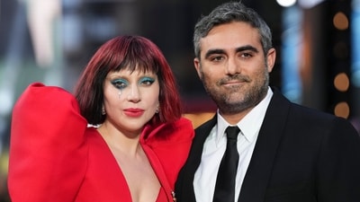 Lady Gaga, left, and Michael Polansky pose for photographers upon arrival at the premiere for the film 'Joker: Folie A Deux' on Wednesday, Sept. 25, 2024, in London. (Photo by Scott A Garfitt/Invision/AP) (Scott A Garfitt/Invision/AP) Lady Gaga, left, and Michael Polansky pose for photographers upon arrival at the premiere for the film 'Joker: Folie A Deux' on Wednesday, Sept. 25, 2024, in London. (Photo by Scott A Garfitt/Invision/AP) (Scott A Garfitt/Invision/AP)