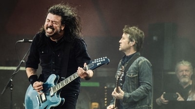 US musician Dave Grohl of rock band Foo Fighters performs on the Orange Stage at Roskilde Festival on July 5, 2024 in Roskilde, Denmark. (Photo by Helle Arensbak / Ritzau Scanpix / AFP) / Denmark OUT (AFP) US musician Dave Grohl of rock band Foo Fighters performs on the Orange Stage at Roskilde Festival on July 5, 2024 in Roskilde, Denmark. (Photo by Helle Arensbak / Ritzau Scanpix / AFP) / Denmark OUT (AFP)