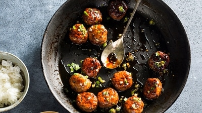 This image released by Milk Street shows a recipe for Japanese chicken meatballs. (Milk Street via AP) This image released by Milk Street shows a recipe for Japanese chicken meatballs. (Milk Street via AP)