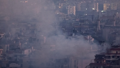 Smoke billows over Beirut's southern suburbs after a strike, amid ongoing hostilities between Hezbollah and Israeli forces, as seen from Sin El Fil, Lebanon. (Reuters)