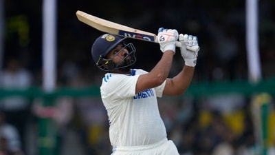 India's captain Rohit Sharma plays a shot on the fourth day of the second cricket test match between Bangladesh and India in Kanpur. (AP) India's captain Rohit Sharma plays a shot on the fourth day of the second cricket test match between Bangladesh and India in Kanpur. (AP)