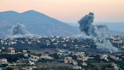 Smoke plumes erupt after an Israeli airstrike targeted the village of Khiam in southern Lebanon near the border with northern Israel. (AFP) Smoke plumes erupt after an Israeli airstrike targeted the village of Khiam in southern Lebanon near the border with northern Israel. (AFP)