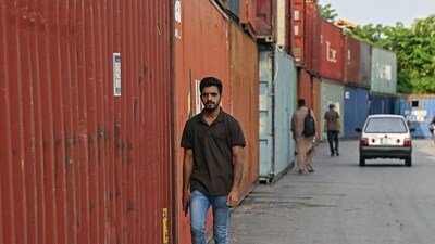 Pakistan will eliminate 150,000 government jobs and consolidate ministries as part of IMF-required reforms for a USD 7 billion loan. The finance minister highlighted a growing economy, increased foreign reserves, and a significant rise in new taxpayers. (AFP) Pakistan will eliminate 150,000 government jobs and consolidate ministries as part of IMF-required reforms for a USD 7 billion loan. The finance minister highlighted a growing economy, increased foreign reserves, and a significant rise in new taxpayers. (AFP)