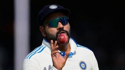 India's captain Rohit Sharma catch a ball on the fourth day of the second cricket test match between Bangladesh and India in Kanpur. (AP) India's captain Rohit Sharma catch a ball on the fourth day of the second cricket test match between Bangladesh and India in Kanpur. (AP)
