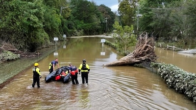 A drone view shows rescue personnel working in a flooded area, following the pass of Hurricane Helene, in Asheville, North Carolina, U.S., September 29, 2024 (REUTERS/Marco Bello) (REUTERS)