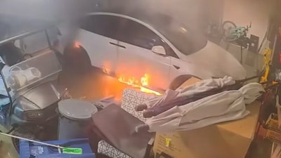 Tesla bursts into flames inside Florida garage flooded by Hurricane Helene (Pinellas County Government/Facebook) Tesla bursts into flames inside Florida garage flooded by Hurricane Helene (Pinellas County Government/Facebook)