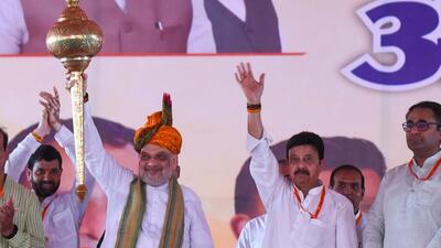 Union home minister Amit Shah, Badshahpur candidate Rao Narbir Singh during Jan Ashirwad Rally in Sector 95 on Sunday. (Parveen Kumar/HT Photo) Union home minister Amit Shah, Badshahpur candidate Rao Narbir Singh during Jan Ashirwad Rally in Sector 95 on Sunday. (Parveen Kumar/HT Photo)