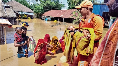 Villagers being shifted to a safer place from a flooded area in Supaul, Bihar, on Monday. (PTI) Villagers being shifted to a safer place from a flooded area in Supaul, Bihar, on Monday. (PTI)