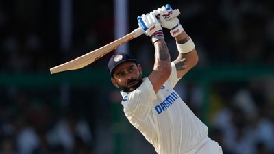 India's Virat Kohli plays a shot on the fourth day of the second cricket test match between Bangladesh and India in Kanpur. (AP) India's Virat Kohli plays a shot on the fourth day of the second cricket test match between Bangladesh and India in Kanpur. (AP)