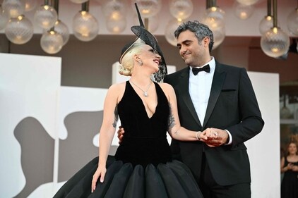 Lady Gaga and Michael Polansky attend the red carpet of the movie 'Joker : Folie a deux' at Venice Lido, on September 4, 2024. (Photo by Alberto PIZZOLI / AFP) (AFP) Lady Gaga and Michael Polansky attend the red carpet of the movie 'Joker : Folie a deux' at Venice Lido, on September 4, 2024. (Photo by Alberto PIZZOLI / AFP) (AFP)