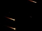 Rockets fly in the sky, amid cross-border hostilities between Hezbollah and Israel, as seen from Tel Aviv, Israel, October 1, 2024. REUTERS/Ammar Awad