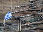 Israeli soldiers sleep on tanks in a staging area in northern Israel near the Israel-Lebanon border, Tuesday, Oct. 1, 2024. (AP Photo/Baz Ratner) Israeli soldiers sleep on tanks in a staging area in northern Israel near the Israel-Lebanon border, Tuesday, Oct. 1, 2024. (AP Photo/Baz Ratner)