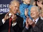 FILE - Sen. Joe Biden and former President Jimmy Carter are seen at the Democratic National Convention in Denver, Aug. 26, 2008. (AP Photo/Paul Sancya, File)