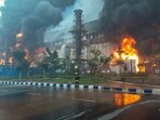 A fireman douses a fire breaking out at a chemical godown of the electronics component factory of Tata Electronics Pvt Ltd, in Hosur, Tamil Nadu.