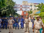 Security personnel stand guard outside Bawana police station, where climate activist Sonam Wangchuk is being held after he was detained by Delhi Police during his 'Dilli Chalo Padyatra', in New Delhi. Security personnel stand guard outside Bawana police station, where climate activist Sonam Wangchuk is being held after he was detained by Delhi Police during his 'Dilli Chalo Padyatra', in New Delhi.