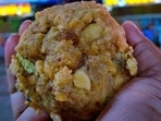 The Tirupati laddu is made by the Tirumala Tirupati Devasthanam which manages the Tirumala Venkateswara temple.