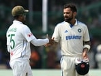 India's Virat Kohli (R) greets Bangladesh's Shakib Al Hasan at the end of the fifth and final day of the second Test. India's Virat Kohli (R) greets Bangladesh's Shakib Al Hasan at the end of the fifth and final day of the second Test.
